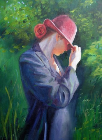 girl with red hat in garden