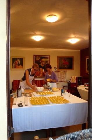 Two women making pasta